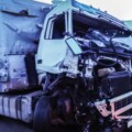 Semi-truck with crushed front fender attests to how many truck accidents happen a year in Florida