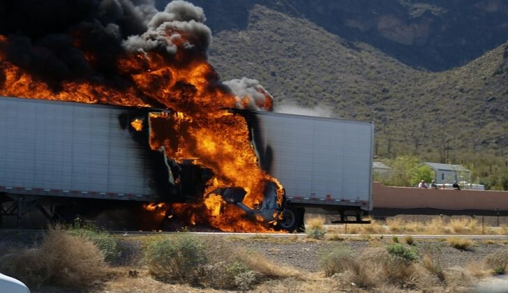 crashed semi truck on fire