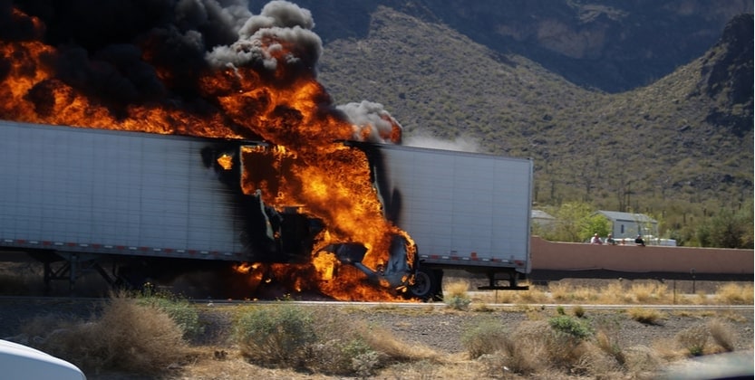 crashed semi truck on fire