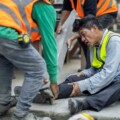 An engineer has an accident where steel falls on his leg at work