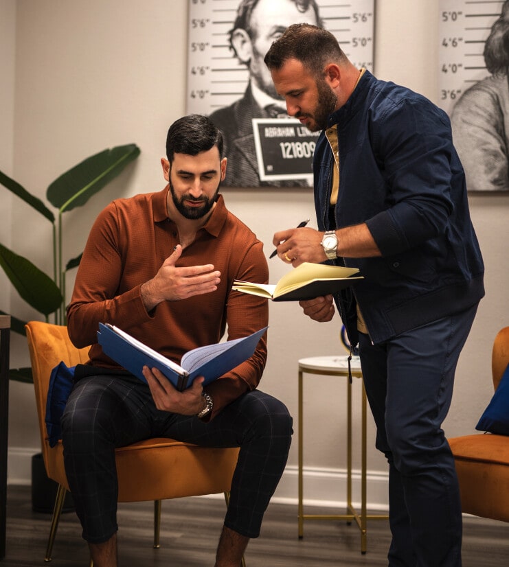 defense attorneys reviewing case