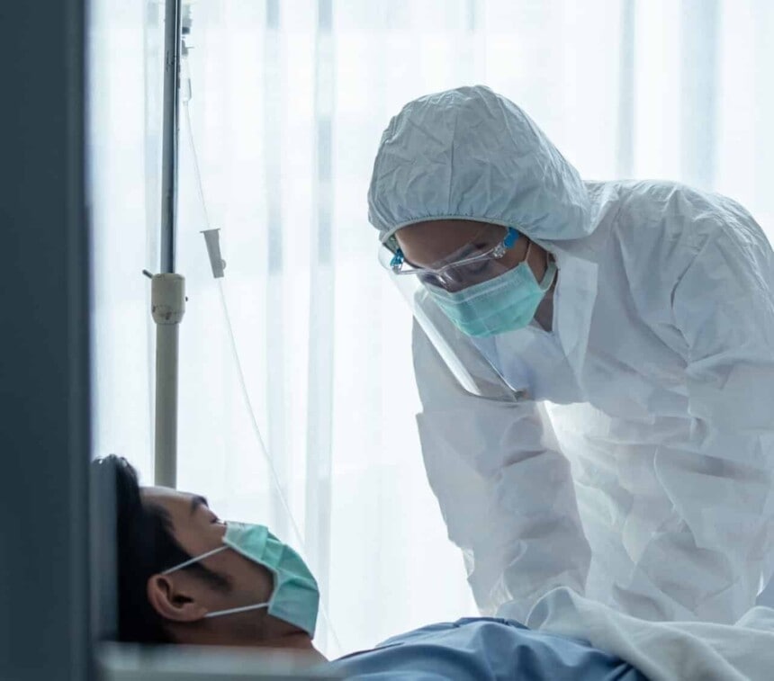 Caucasian doctor, nurse or scientist holding vaccine shot for injection to patient in hospital.