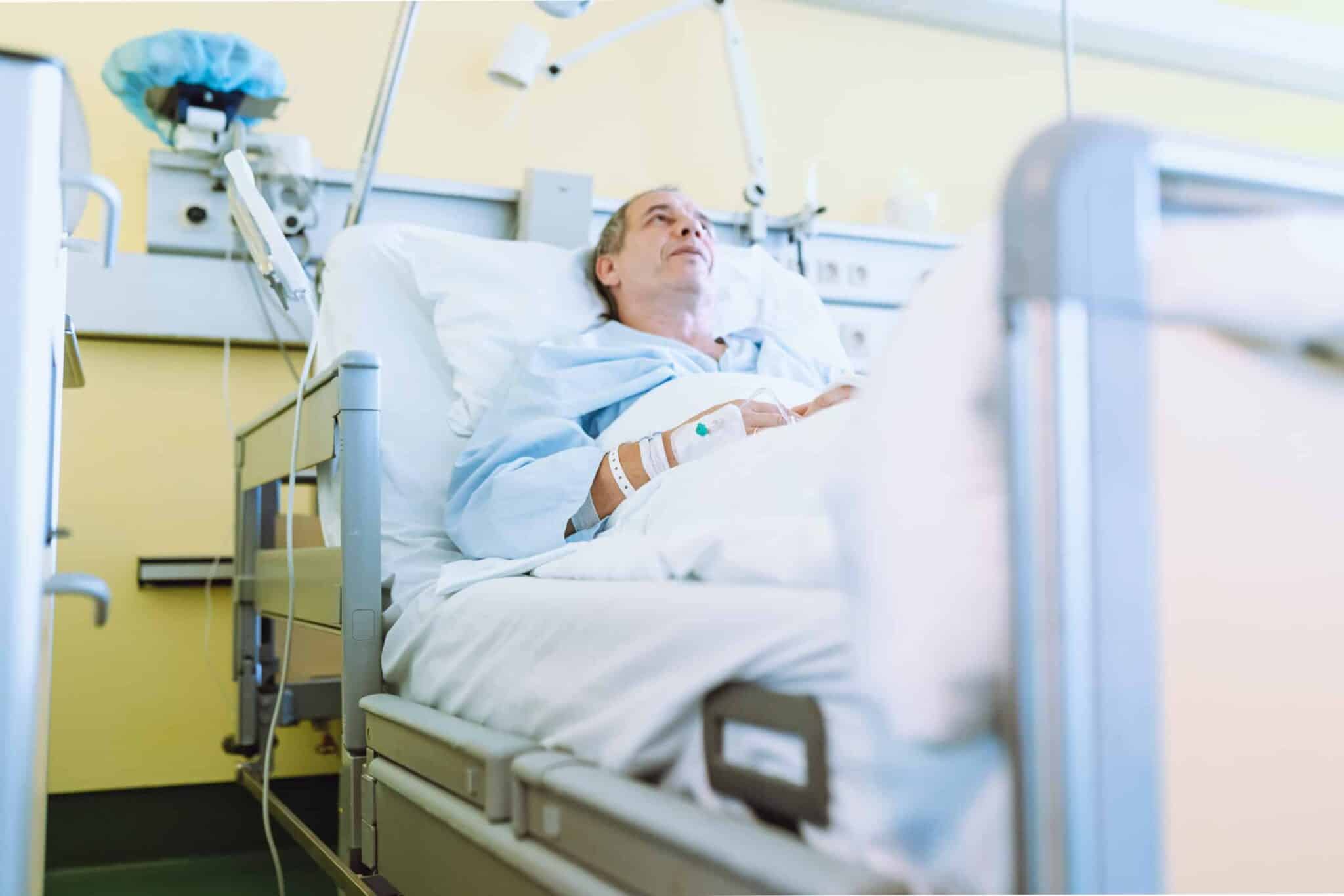 Male patient after injury or surgery in hospital ward