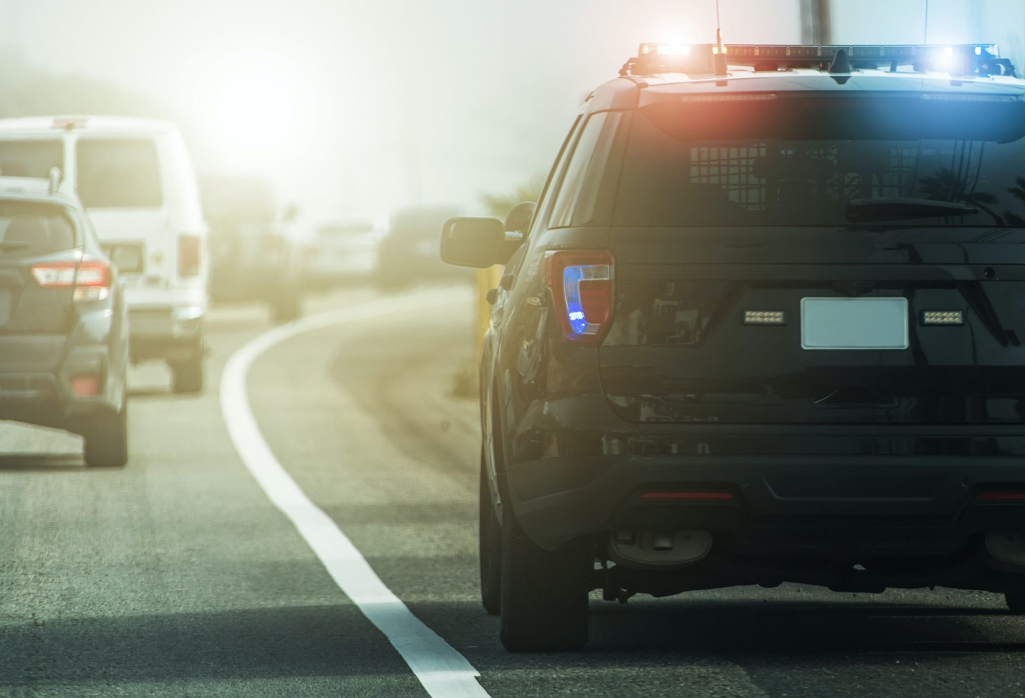 Highway Police Patrol Cruiser on Side of a Road