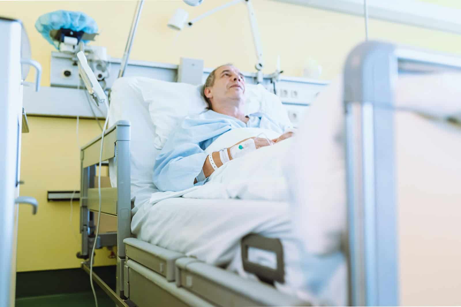 Male patient after injury or surgery in hospital ward