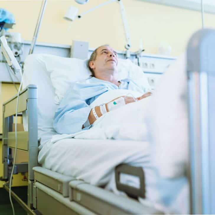 Male patient after injury or surgery in hospital ward