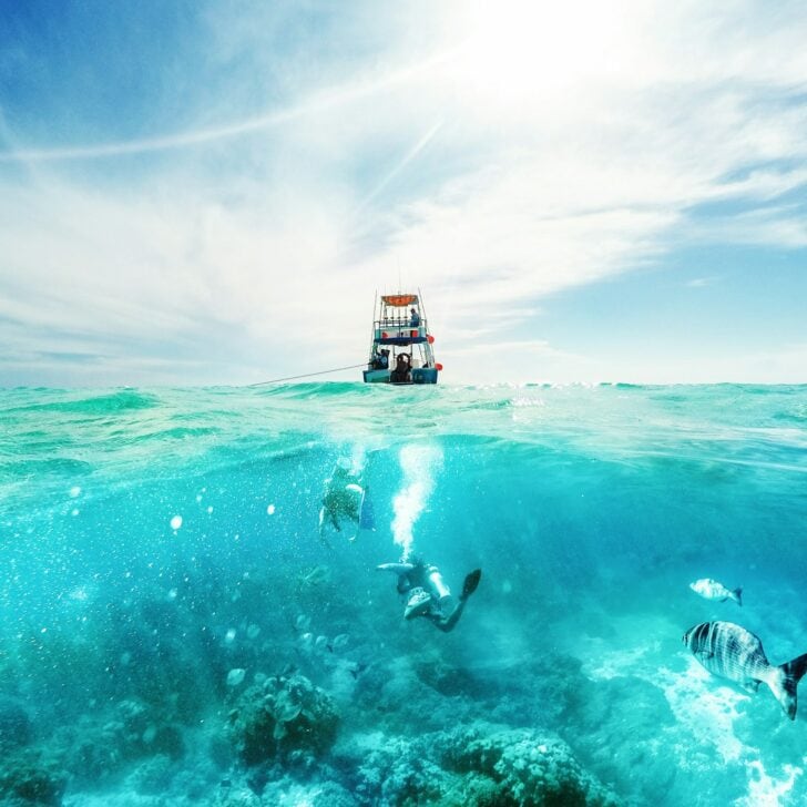 Divers and Boat in the Caribbean Sea
