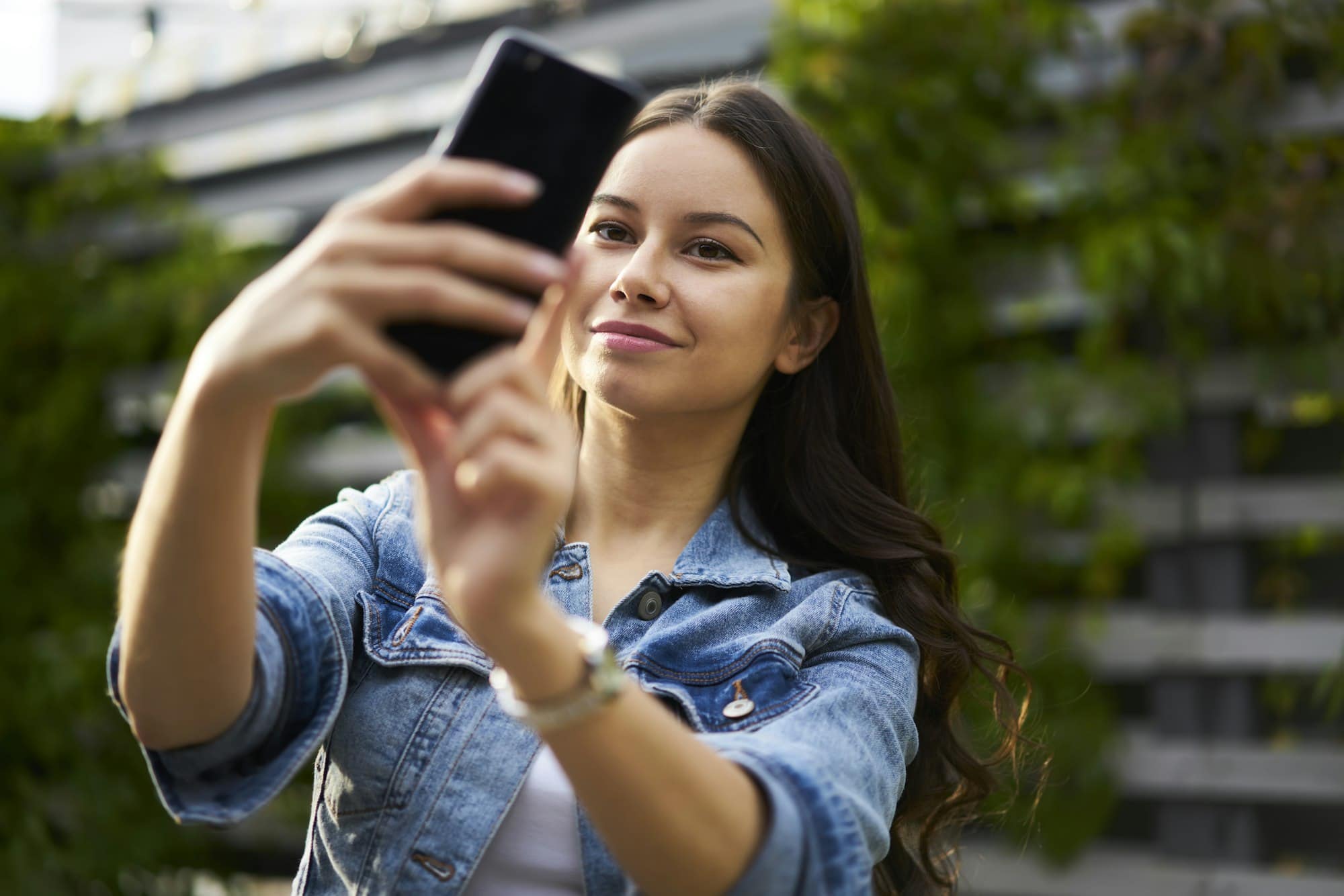 Caucasian travel girl shooting influence video vlog for sharing to social media