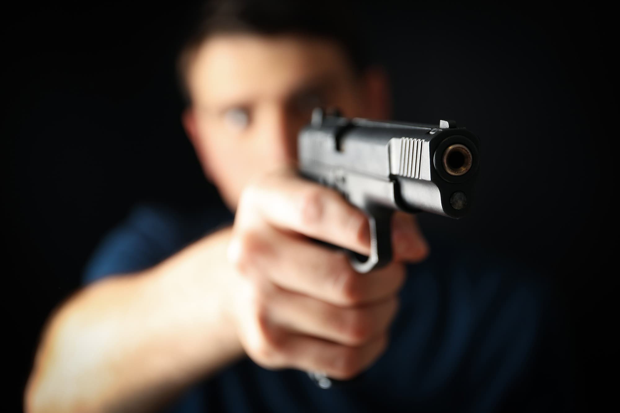 Man hold pistol. Selective focus. Self defense weapon