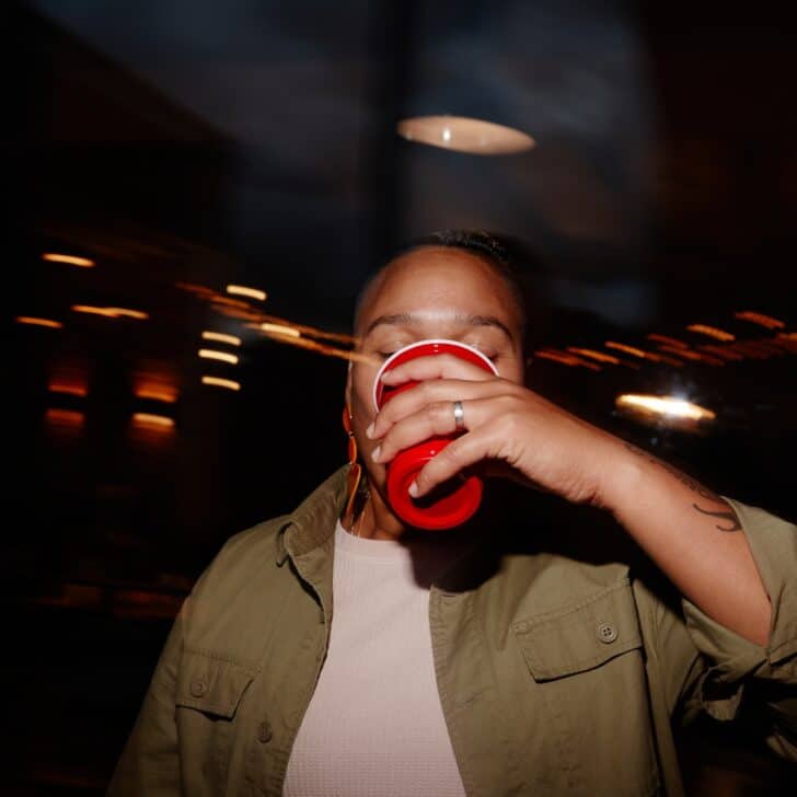 Young Woman Drinking Alcohol