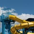 Empty water Park twisted water slide amusement resort for children and family vacations on a