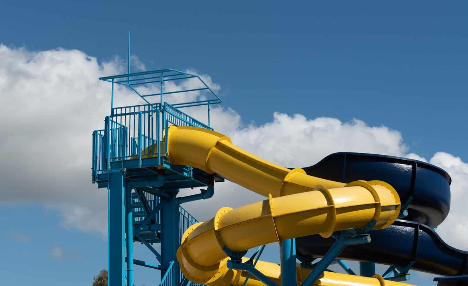 Empty water Park twisted water slide amusement resort for children and family vacations on a