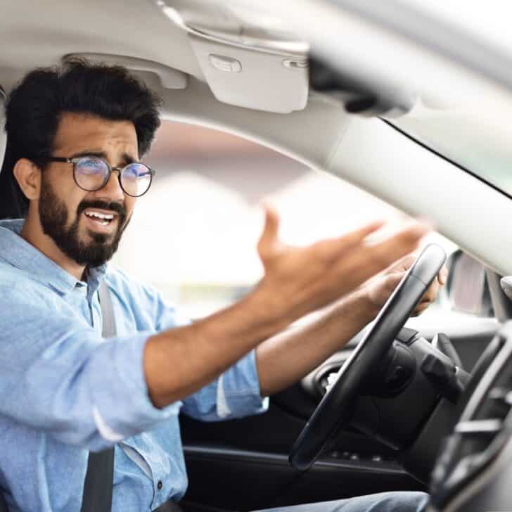 Angry indian man driver fighting on the road