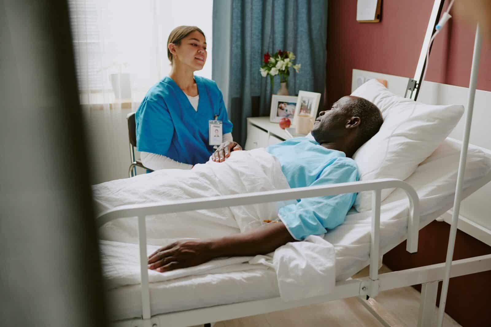 Providing Care to Patient in Hospital Bed
